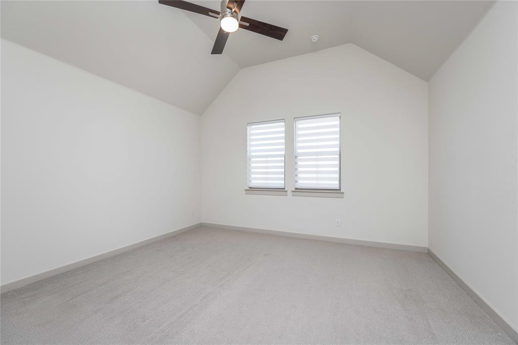 208 Spring Hill Road Flower Mound, TX 75028 - Photo 20 of 35 an empty room with a window