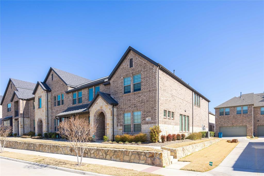 208 Spring Hill Road Flower Mound, TX 75028 - Photo 2 of 35 a front view of residential houses with yard