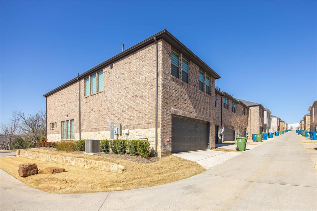 208 Spring Hill Road Flower Mound, TX 75028 - Photo 26 of 35 a view of a house with a sink and a yard