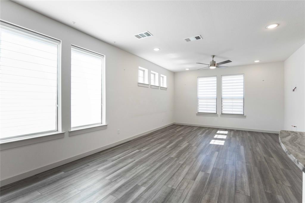 208 Spring Hill Road Flower Mound, TX 75028 - Photo 9 of 35 a view of an empty room and a window