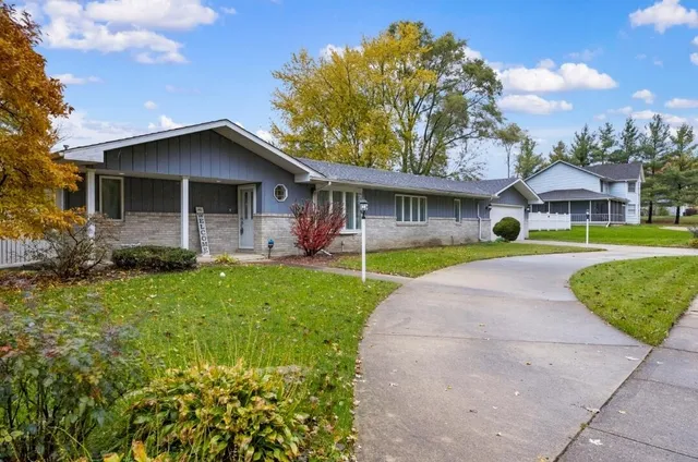 a view of outdoor space yard and front view of a house