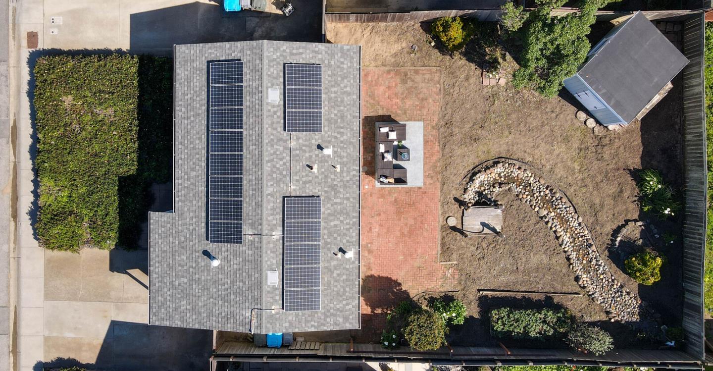 555 Esplanade Avenue Pacifica, CA 94044 - Photo 12 of 32 an aerial view of a house with a yard