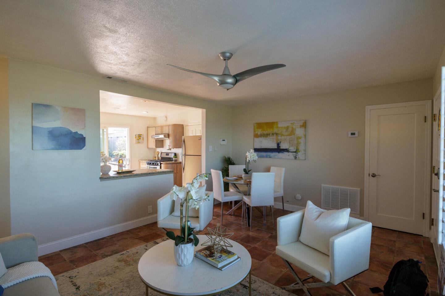 555 Esplanade Avenue Pacifica, CA 94044 - Photo 15 of 32 a living room with furniture and a wooden floor