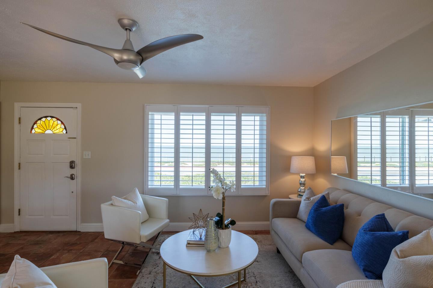 555 Esplanade Avenue Pacifica, CA 94044 - Photo 16 of 32 a living room with furniture and a window