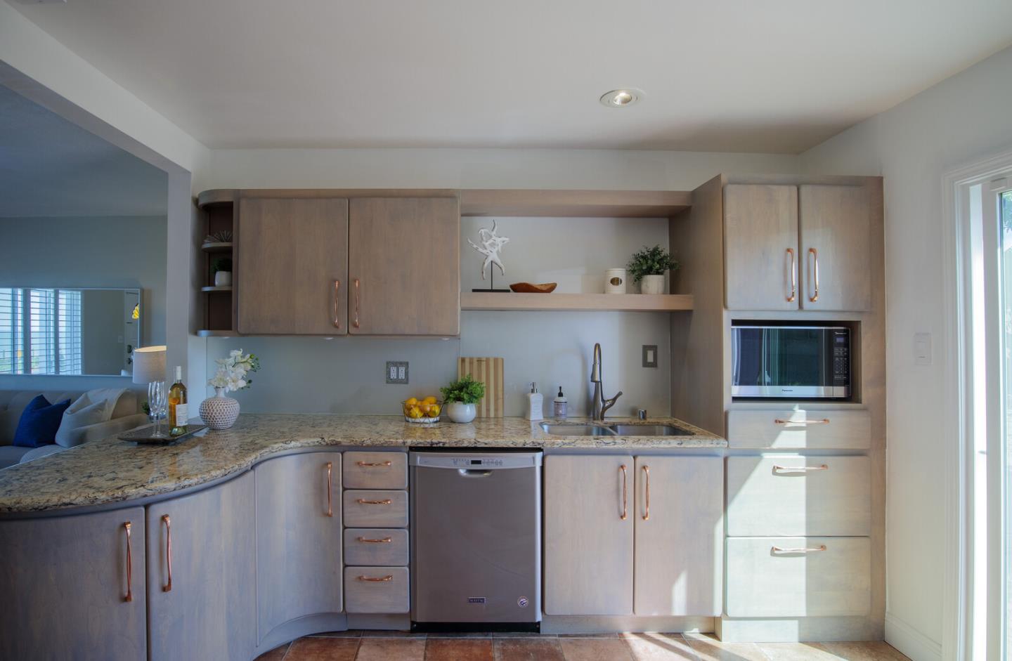 555 Esplanade Avenue Pacifica, CA 94044 - Photo 20 of 32 a kitchen with cabinets and window