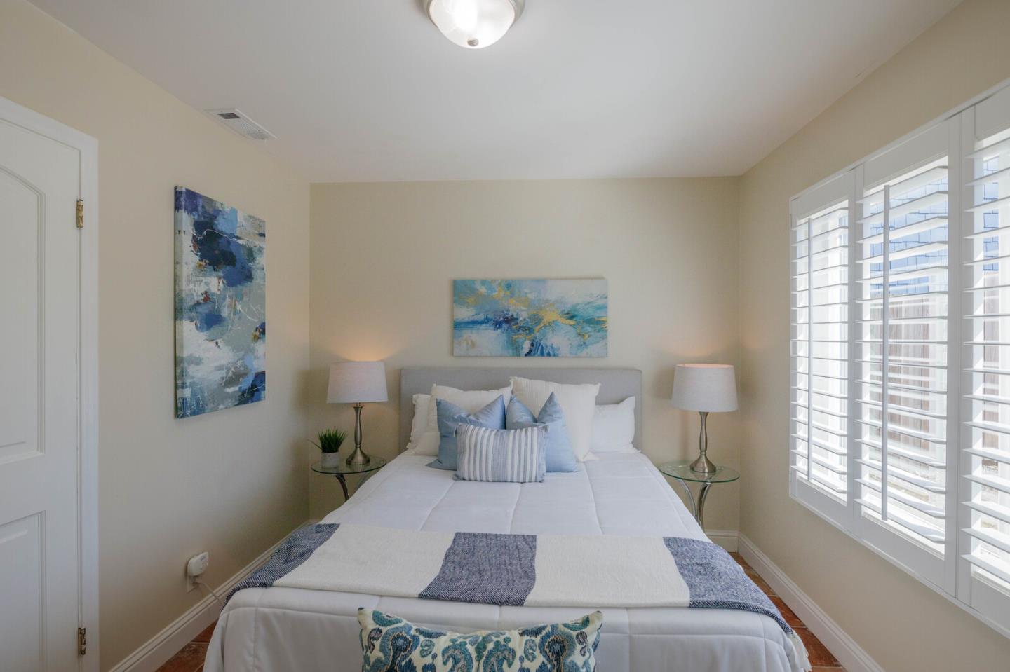 555 Esplanade Avenue Pacifica, CA 94044 - Photo 25 of 32 a bed room with a bed and a window