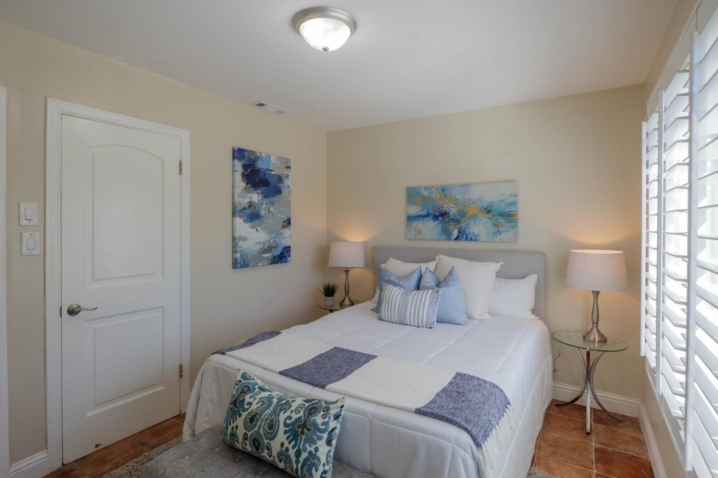 555 Esplanade Avenue Pacifica, CA 94044 - Photo 26 of 32 a bedroom with a bed and a window