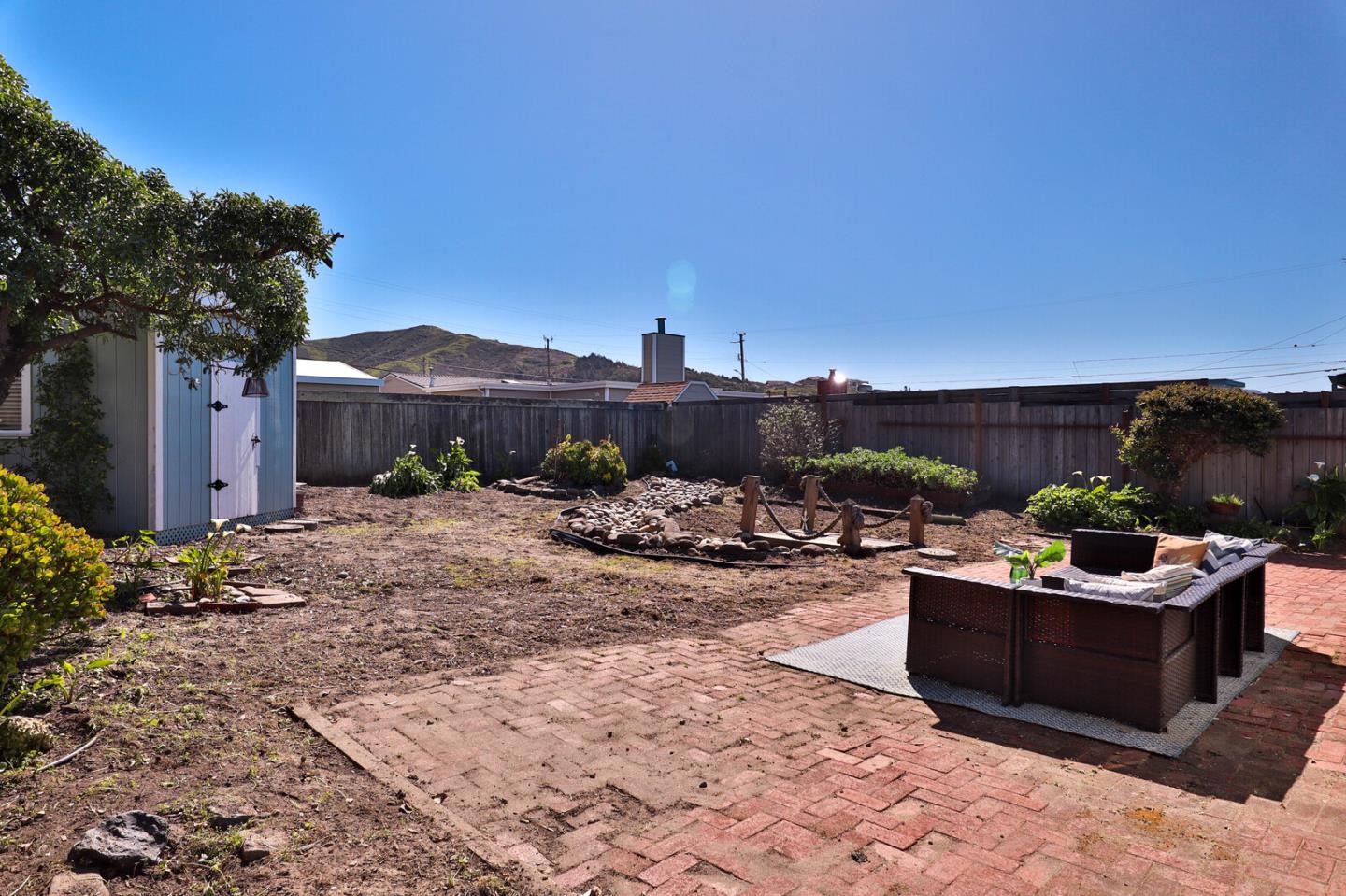 555 Esplanade Avenue Pacifica, CA 94044 - Photo 30 of 32 a view of a patio with couches and potted plants