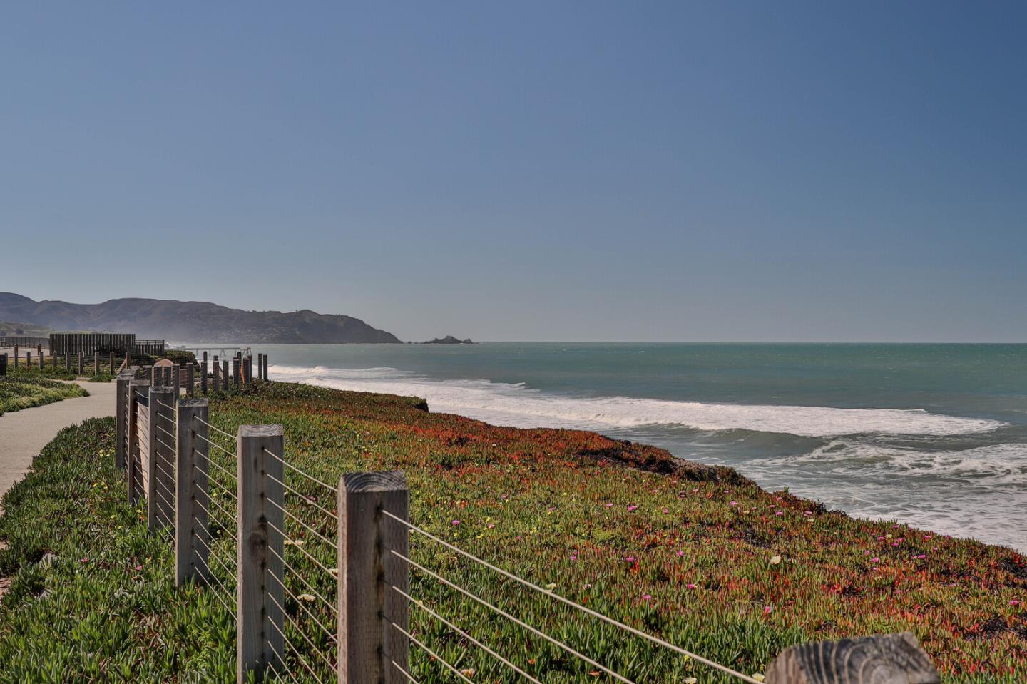 555 Esplanade Avenue Pacifica, CA 94044 - Photo 8 of 32 a view of an ocean and beach