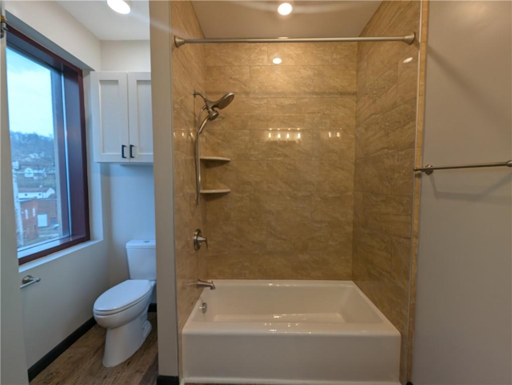 101 East Lincoln Avenue, Unit 3 McDonald, PA 15057 - Photo 11 of 14 a bathroom with a shower and a toilet