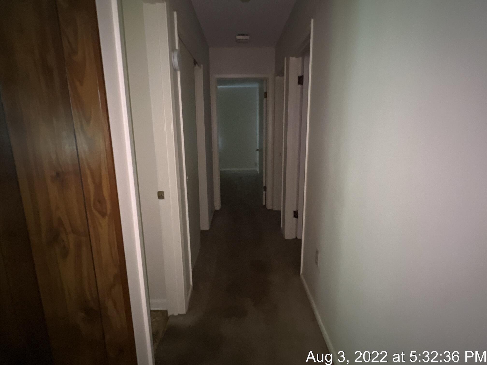5355 Keyser Mill Road Baker, FL 32531 - Photo 6 of 16 a view of a bathroom from a hallway