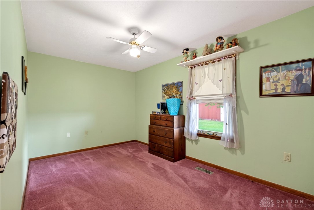 2470 Clark Run Road Xenia, OH 45385 - Photo 11 of 57 This spacious room offers comfort and versatility, perfect for rest or creative pursuits.