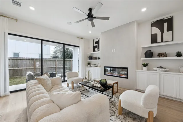 a kitchen with stainless steel appliances granite countertop a sink a stove a microwave and cabinets