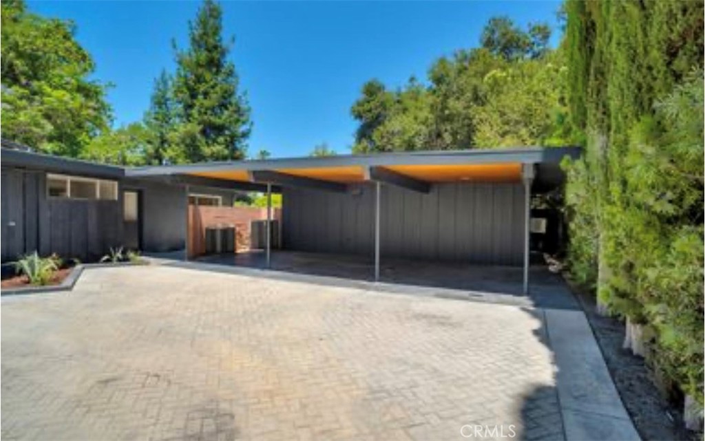 16459 Garvin Drive Encino, CA 91436 - Photo 3 of 26 a house with trees in the background