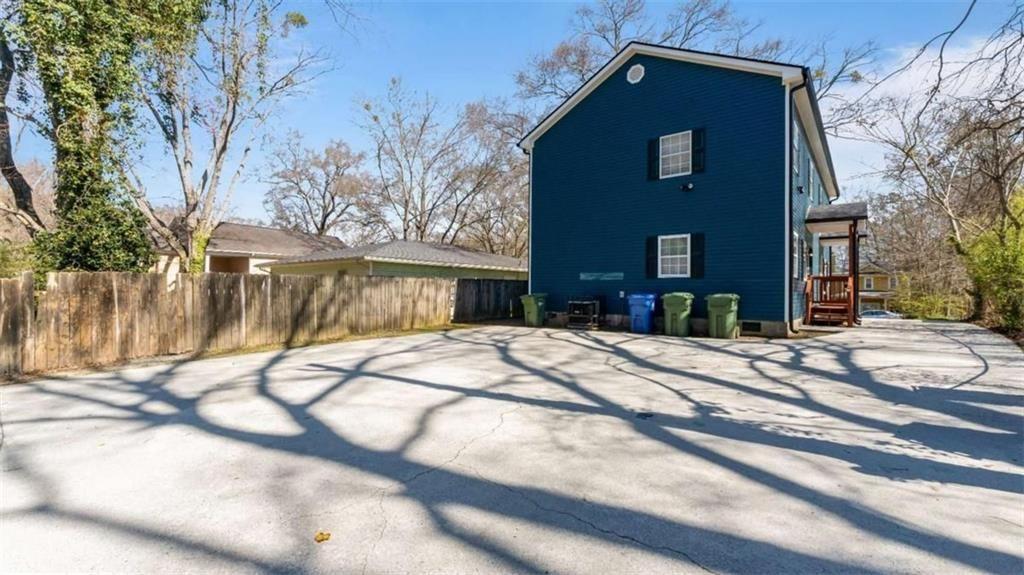 848 Ridge Avenue Northwest, Unit A Atlanta, GA 30318 - Photo 18 of 26 a view of a house with a yard