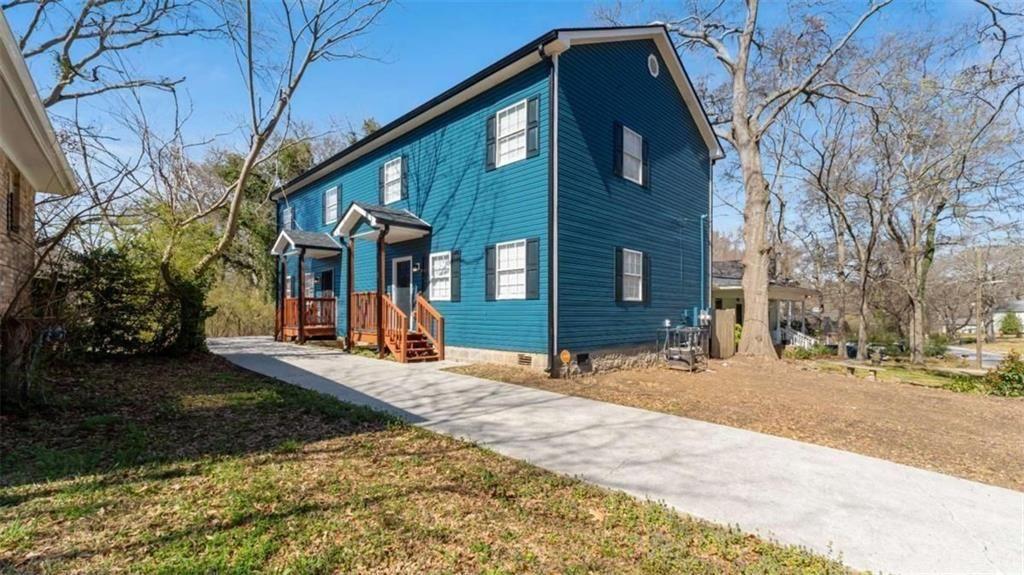 848 Ridge Avenue Northwest, Unit A Atlanta, GA 30318 - Photo 21 of 26 a view of the house with a yard