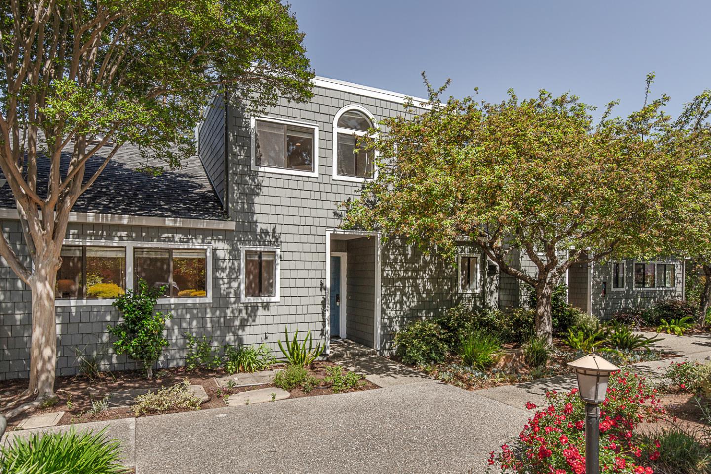 2080 Marich Way, Unit 8 Mountain View, CA 94040 - Photo 1 of 23 front view of a house with a yard