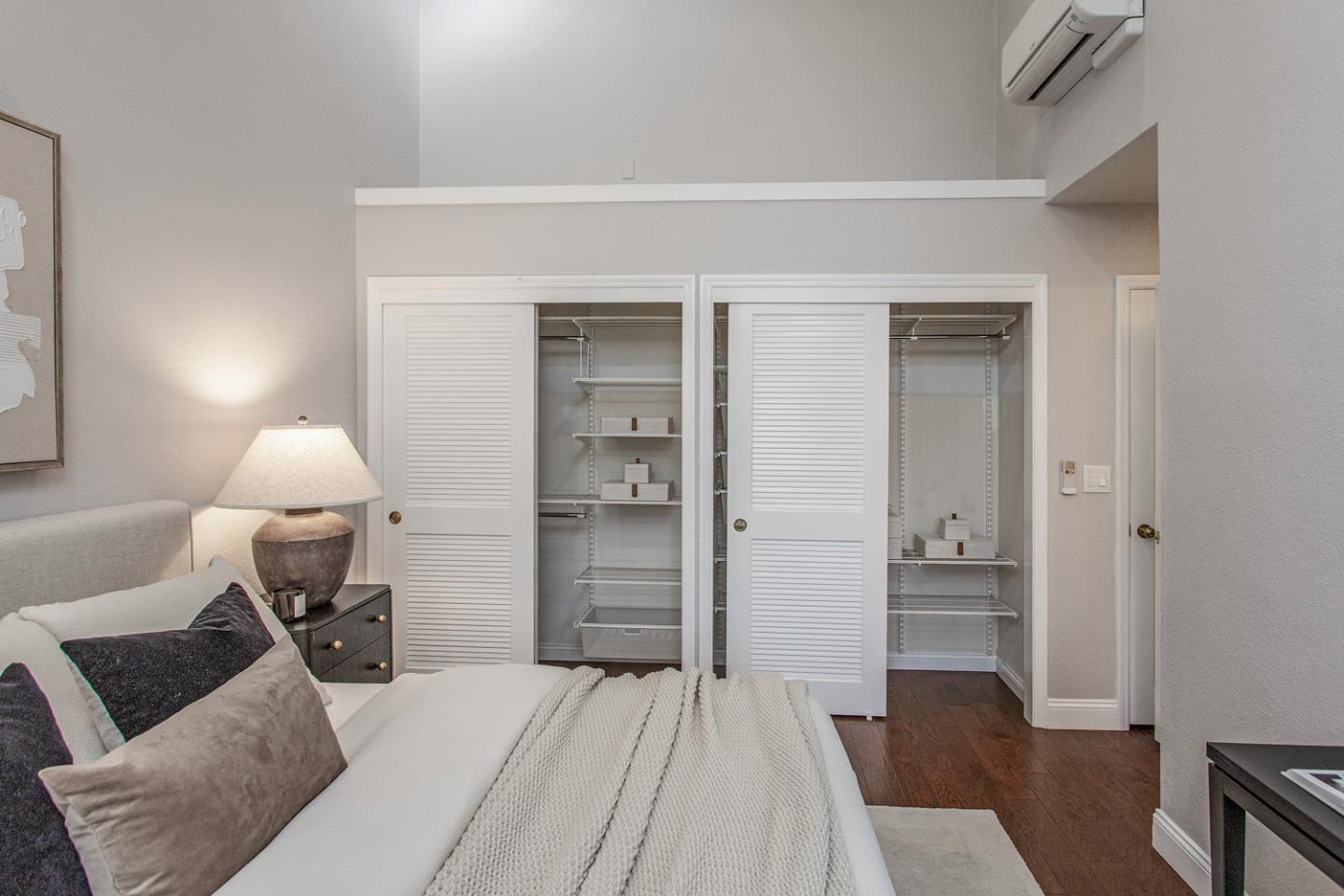 2080 Marich Way, Unit 8 Mountain View, CA 94040 - Photo 13 of 23 a room with a bed and furniture