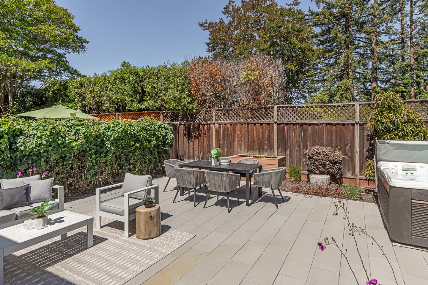 2080 Marich Way, Unit 8 Mountain View, CA 94040 - Photo 18 of 23 a view of backyard with seating space and trees