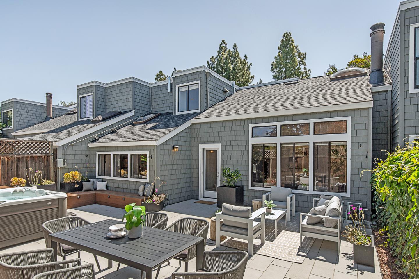 2080 Marich Way, Unit 8 Mountain View, CA 94040 - Photo 21 of 23 a view of a patio with couches table and chairs and potted plants