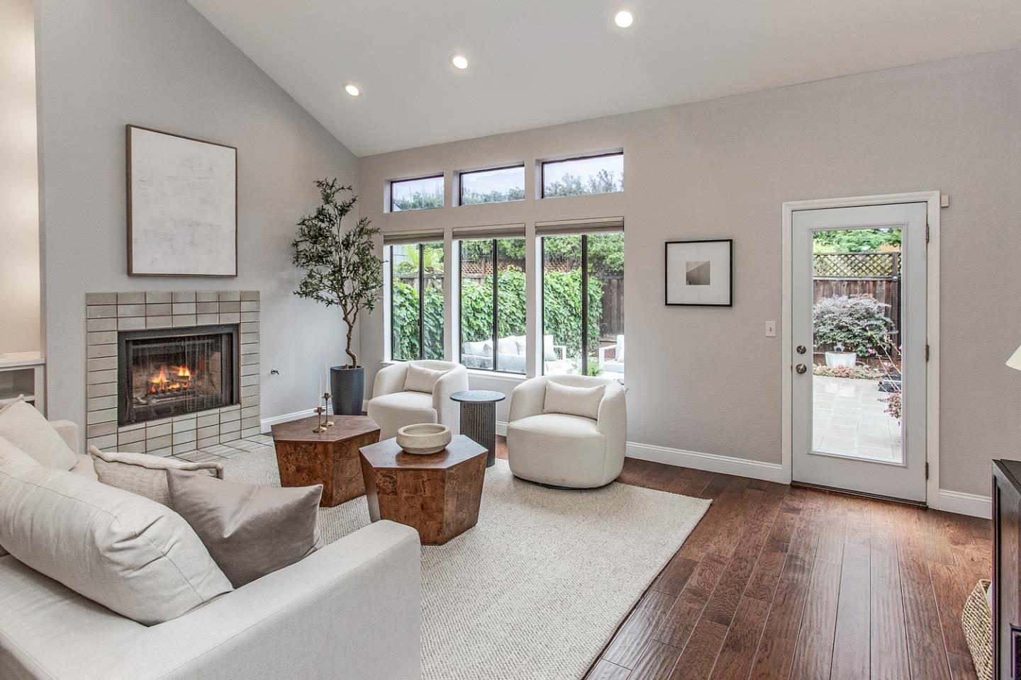 2080 Marich Way, Unit 8 Mountain View, CA 94040 - Photo 3 of 23 a living room with furniture and a fireplace