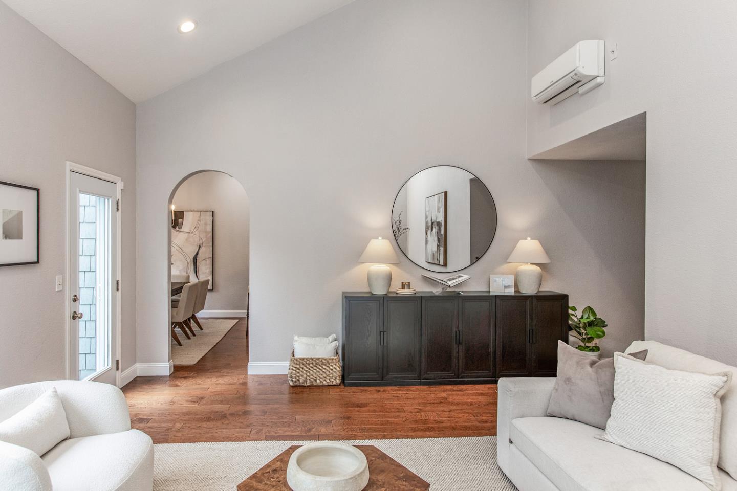 2080 Marich Way, Unit 8 Mountain View, CA 94040 - Photo 5 of 23 a living room with furniture a mirror and wooden floor