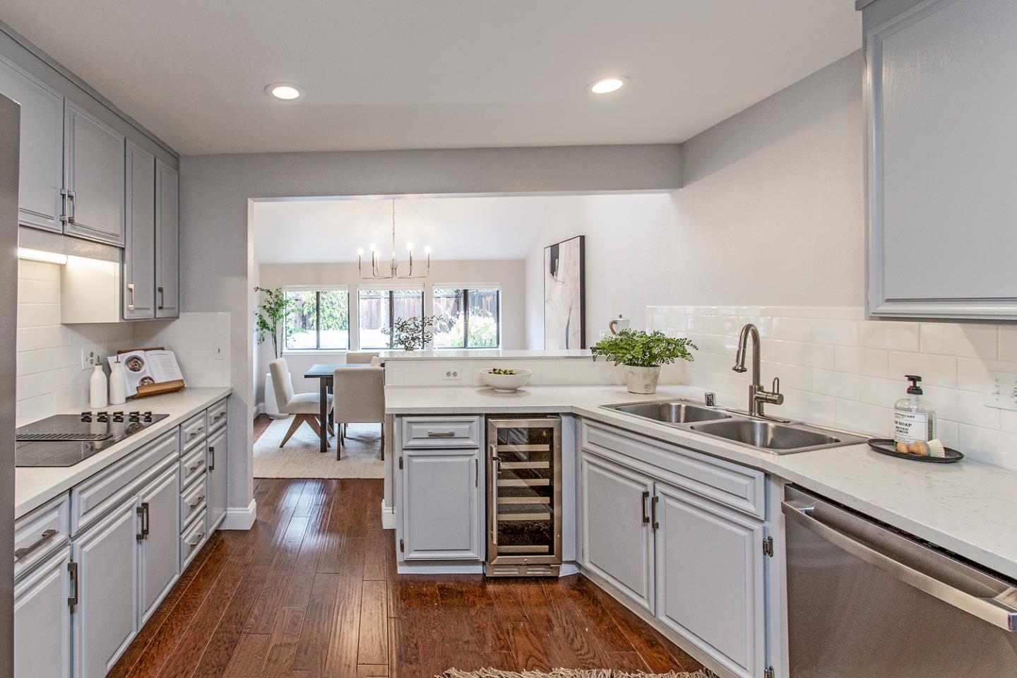 2080 Marich Way, Unit 8 Mountain View, CA 94040 - Photo 9 of 23 a kitchen with a sink stove and cabinets