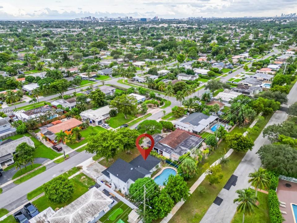 1165 Southwest 4th Terrace Pompano Beach, FL 33060 - Photo 5 of 42 an aerial view of residential houses with outdoor space