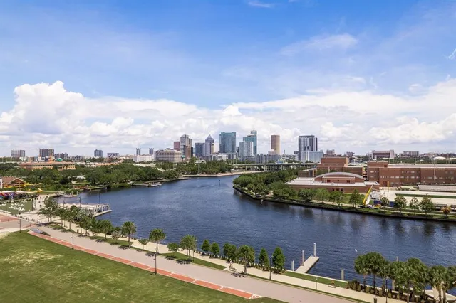 a view of a city with tall buildings