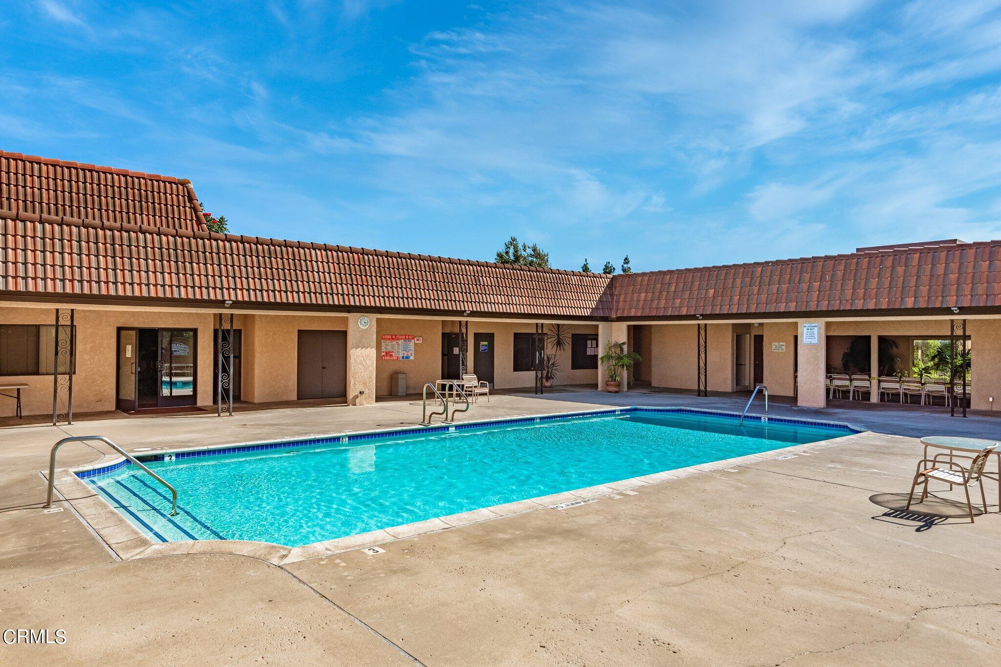 520 Raspberry Place, Unit 35 Oxnard, CA 93036 - Photo 23 of 27 a front view of house with yard and outdoor seating