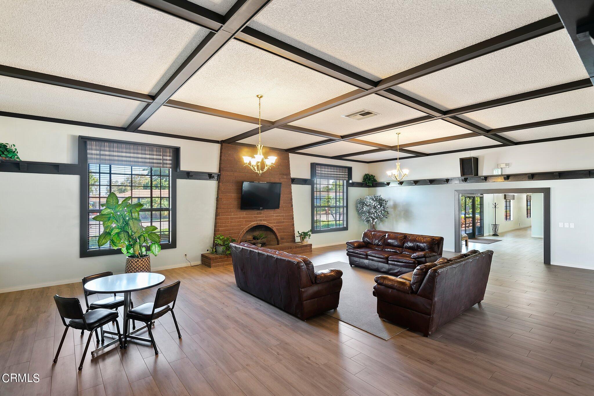 520 Raspberry Place, Unit 35 Oxnard, CA 93036 - Photo 25 of 27 a living room with furniture and a large window