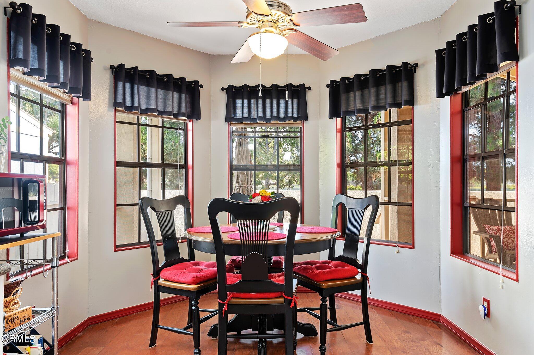520 Raspberry Place, Unit 35 Oxnard, CA 93036 - Photo 10 of 27 a view of a dining room with furniture and chandelier