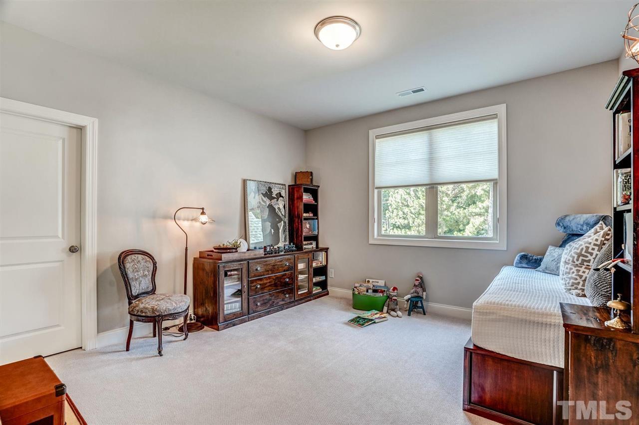 14010 Durant Road Raleigh, NC 27614 - Photo 24 of 30 a bedroom with furniture and a window