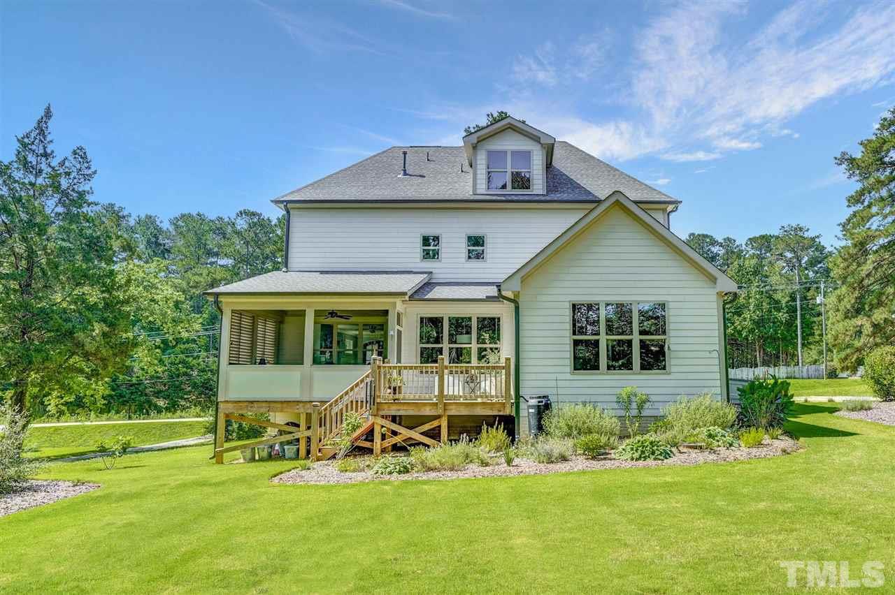 14010 Durant Road Raleigh, NC 27614 - Photo 29 of 30 a front view of a house with a yard