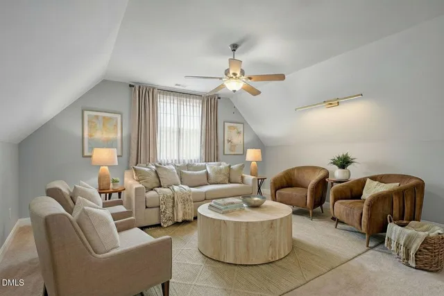 a view of a house with potted plants