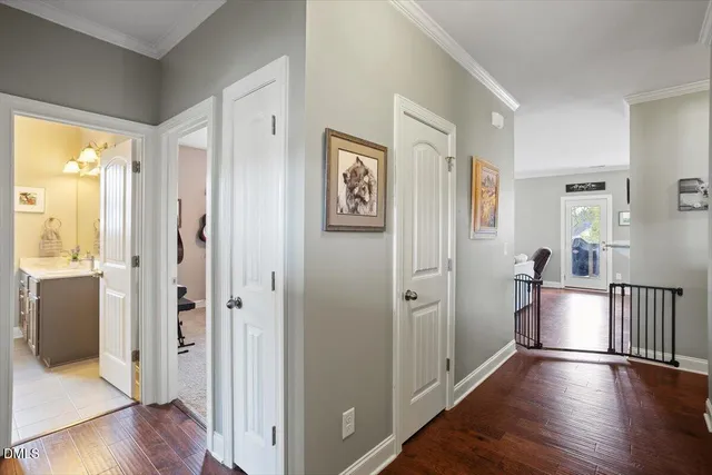 a kitchen with a sink a counter space and cabinets