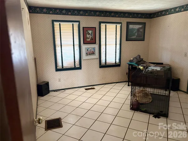 a bathroom with a toilet and a sink