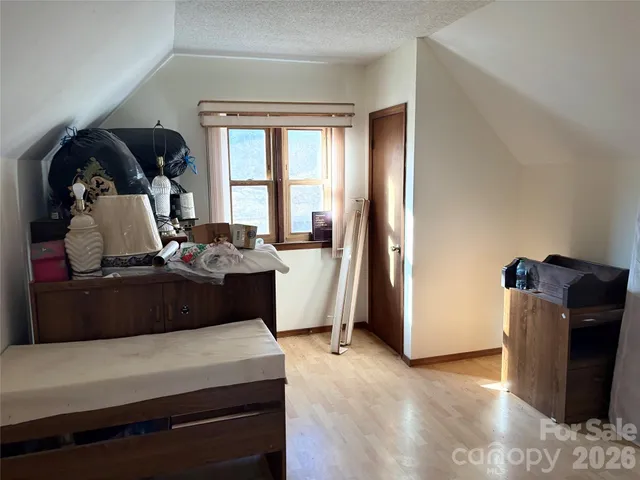 a view of front of house with a patio