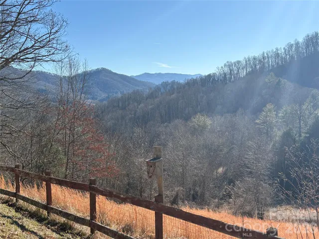 a view of balcony with wooden floor