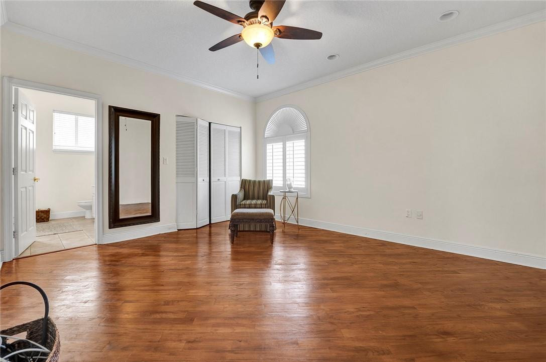20240 Southwest 51st Court Southwest Ranches, FL 33332 - Photo 40 of 60 a view of a livingroom with a furniture and chandelier fan