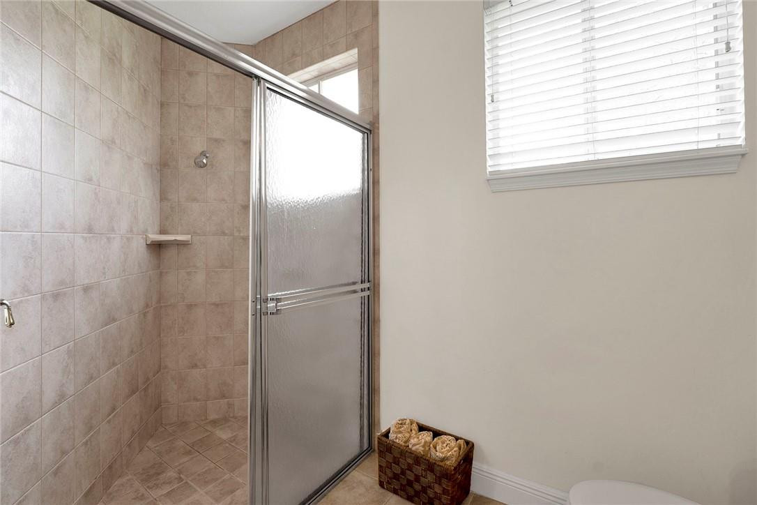 20240 Southwest 51st Court Southwest Ranches, FL 33332 - Photo 42 of 60 a bathroom with a window