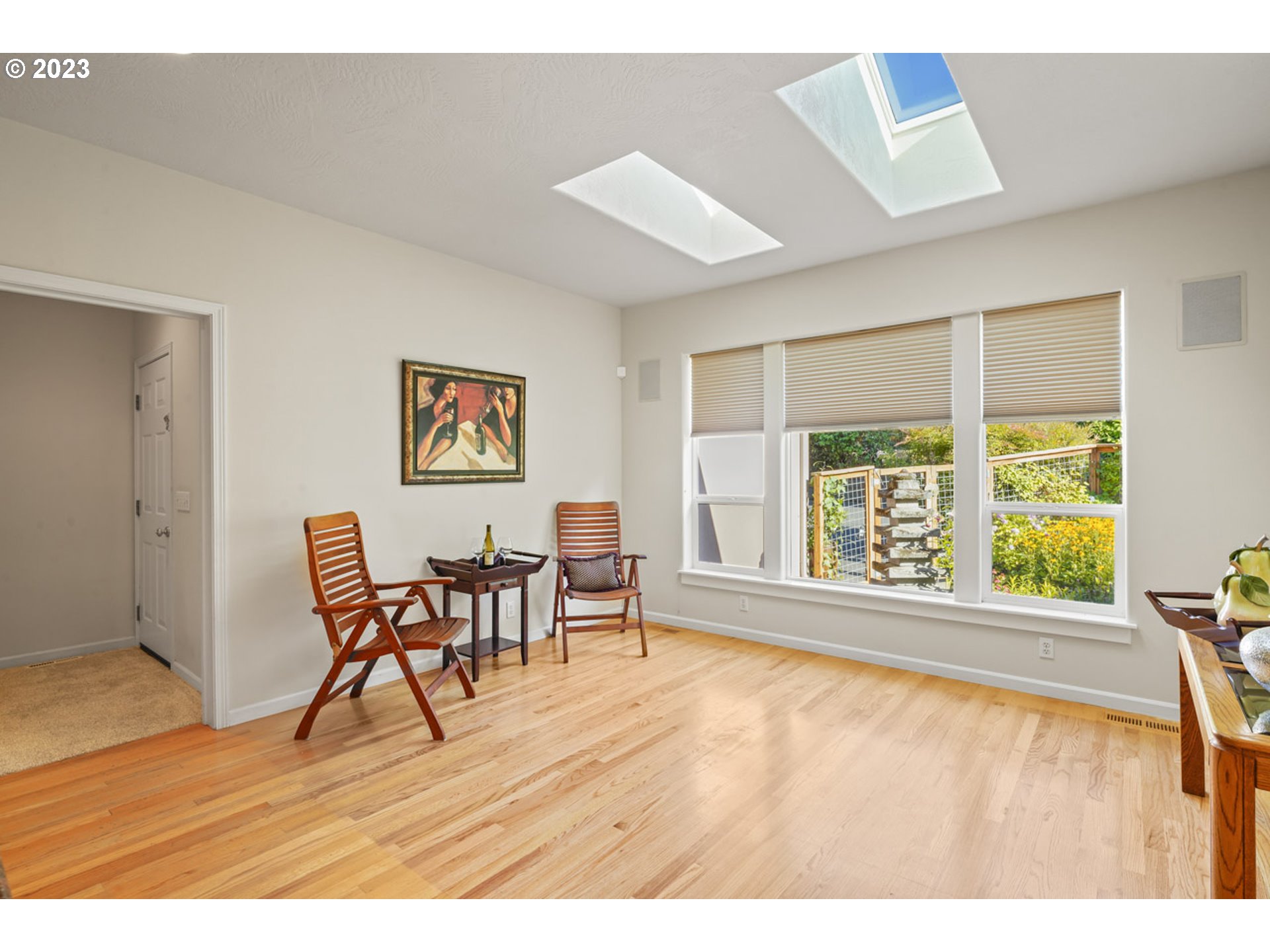 2920 Adams Street Eugene, OR 97405 - Photo 12 of 38 a view of a livingroom with furniture window and wooden floor