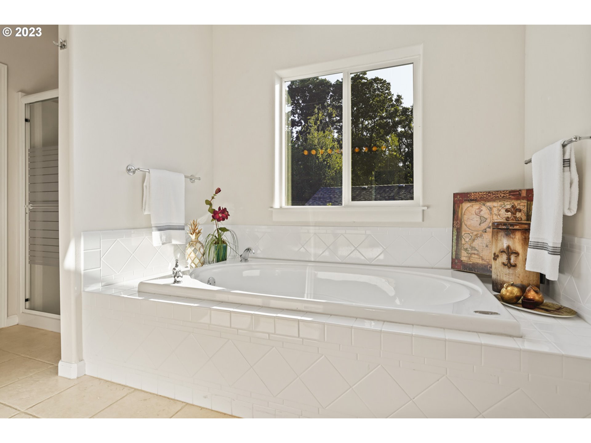 2920 Adams Street Eugene, OR 97405 - Photo 18 of 38 a bathroom with a tub sink and mirror