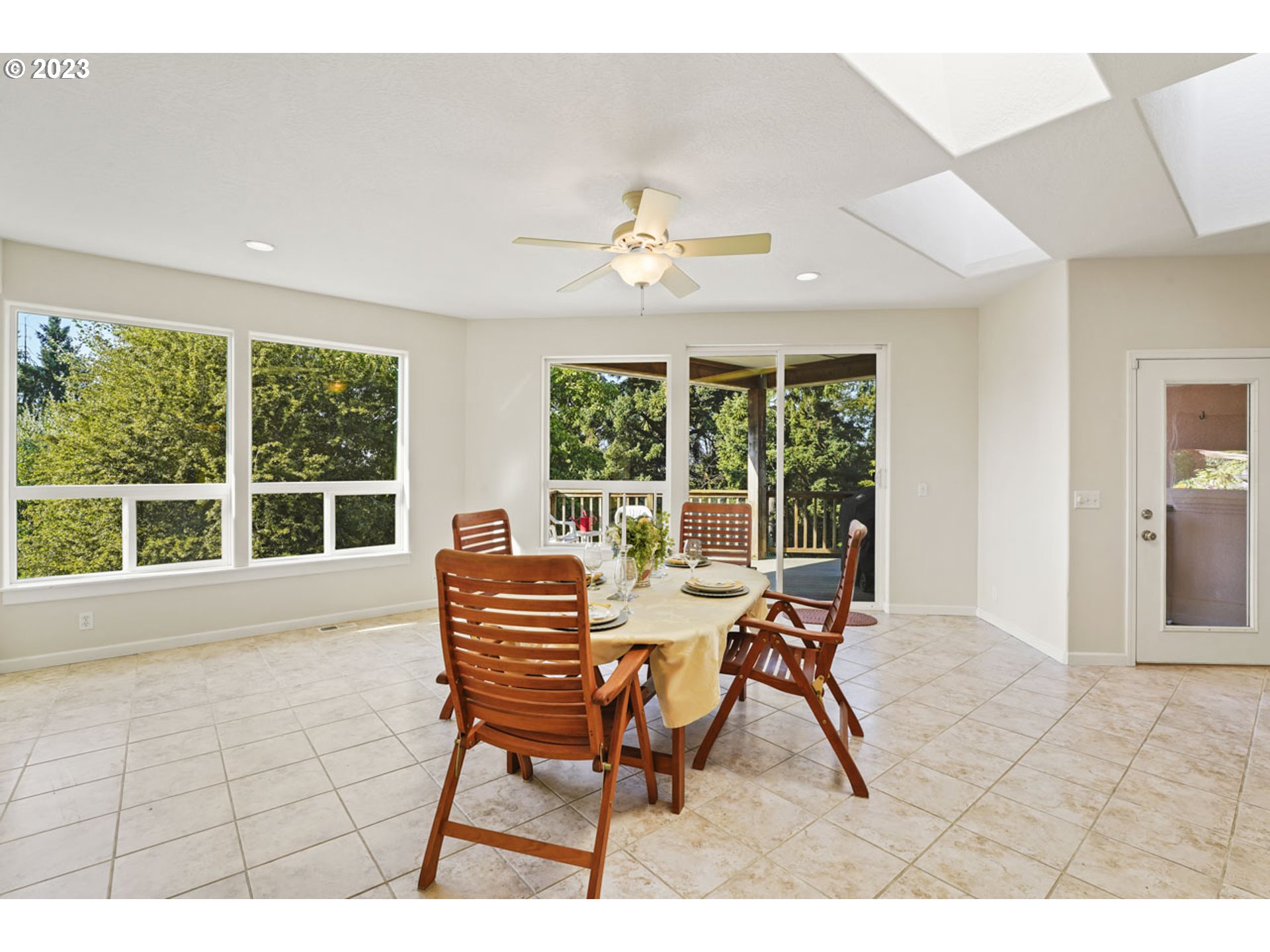 2920 Adams Street Eugene, OR 97405 - Photo 20 of 38 a patio with yard glass top table and sofas