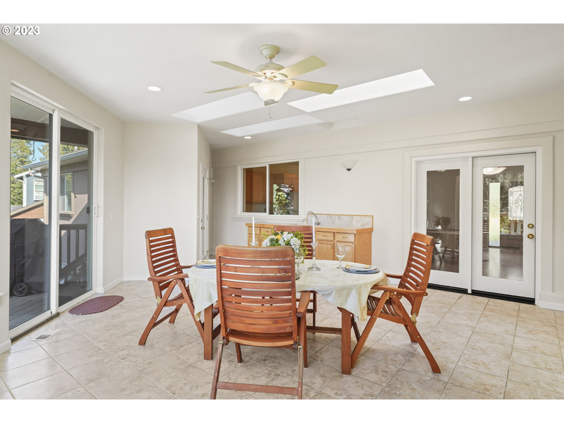 2920 Adams Street Eugene, OR 97405 - Photo 21 of 38 a dining room with a wooden table and chairs