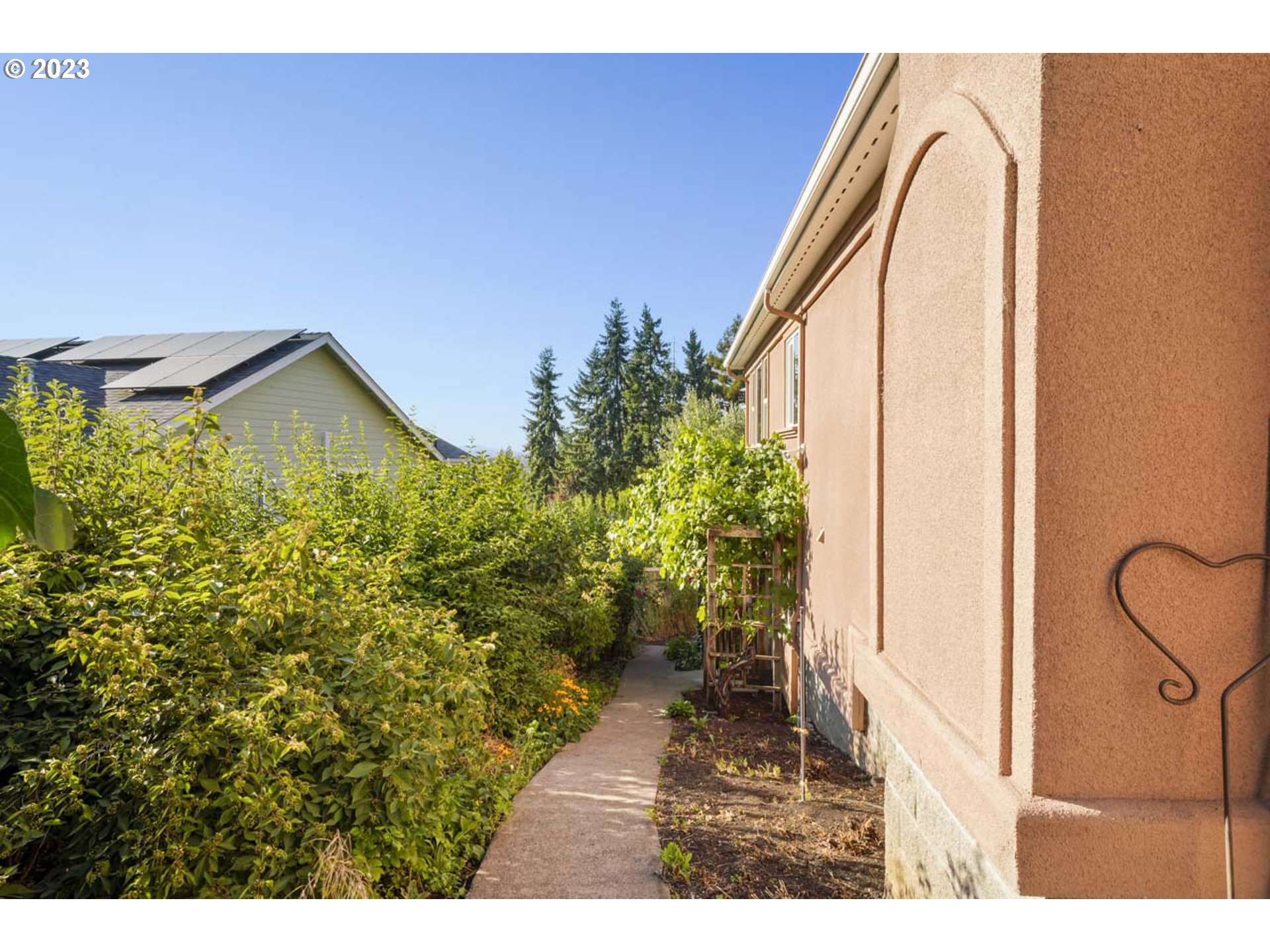 2920 Adams Street Eugene, OR 97405 - Photo 23 of 38 a view of a house with a backyard