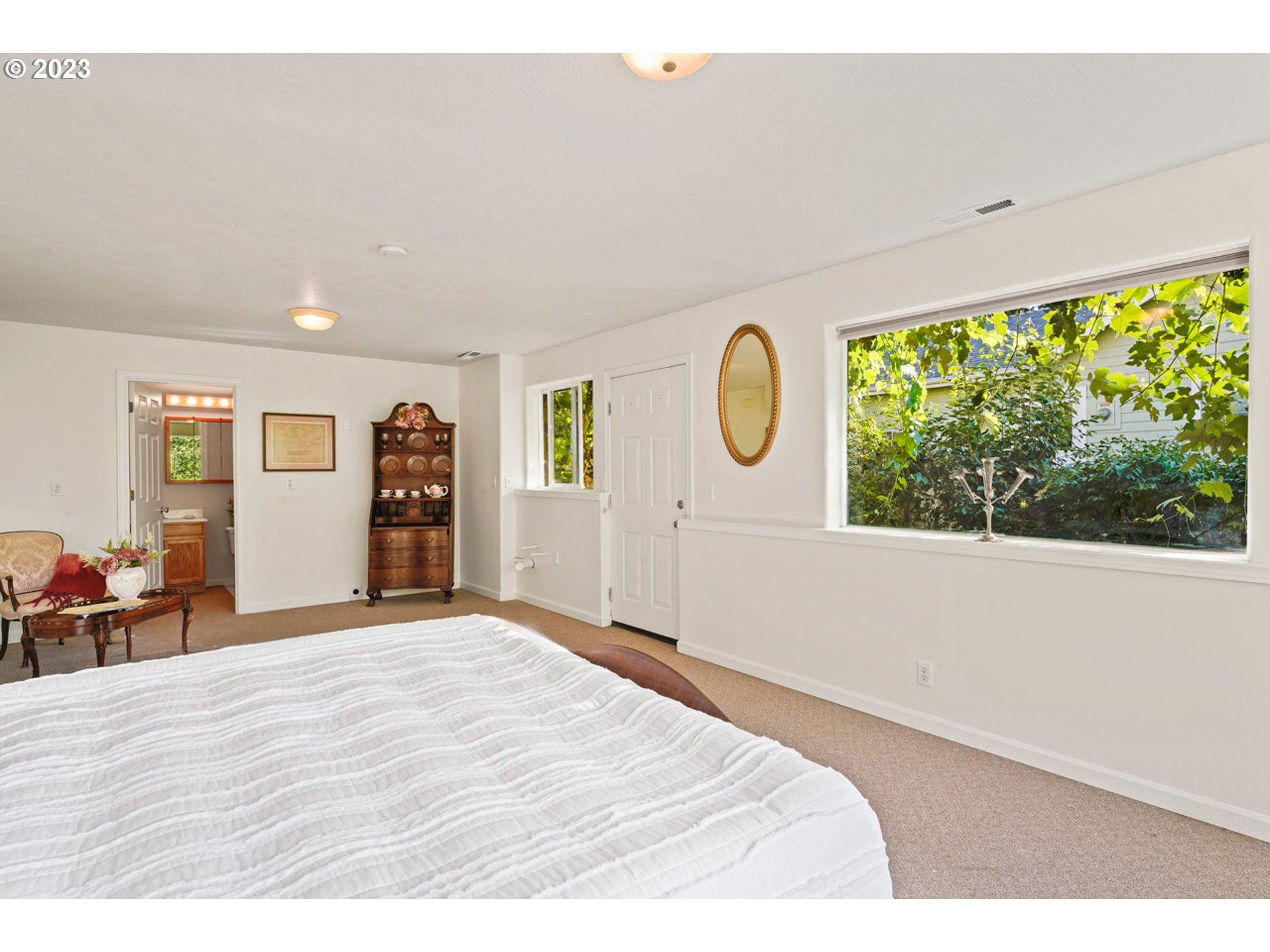2920 Adams Street Eugene, OR 97405 - Photo 24 of 38 a bedroom with a bed and a large window