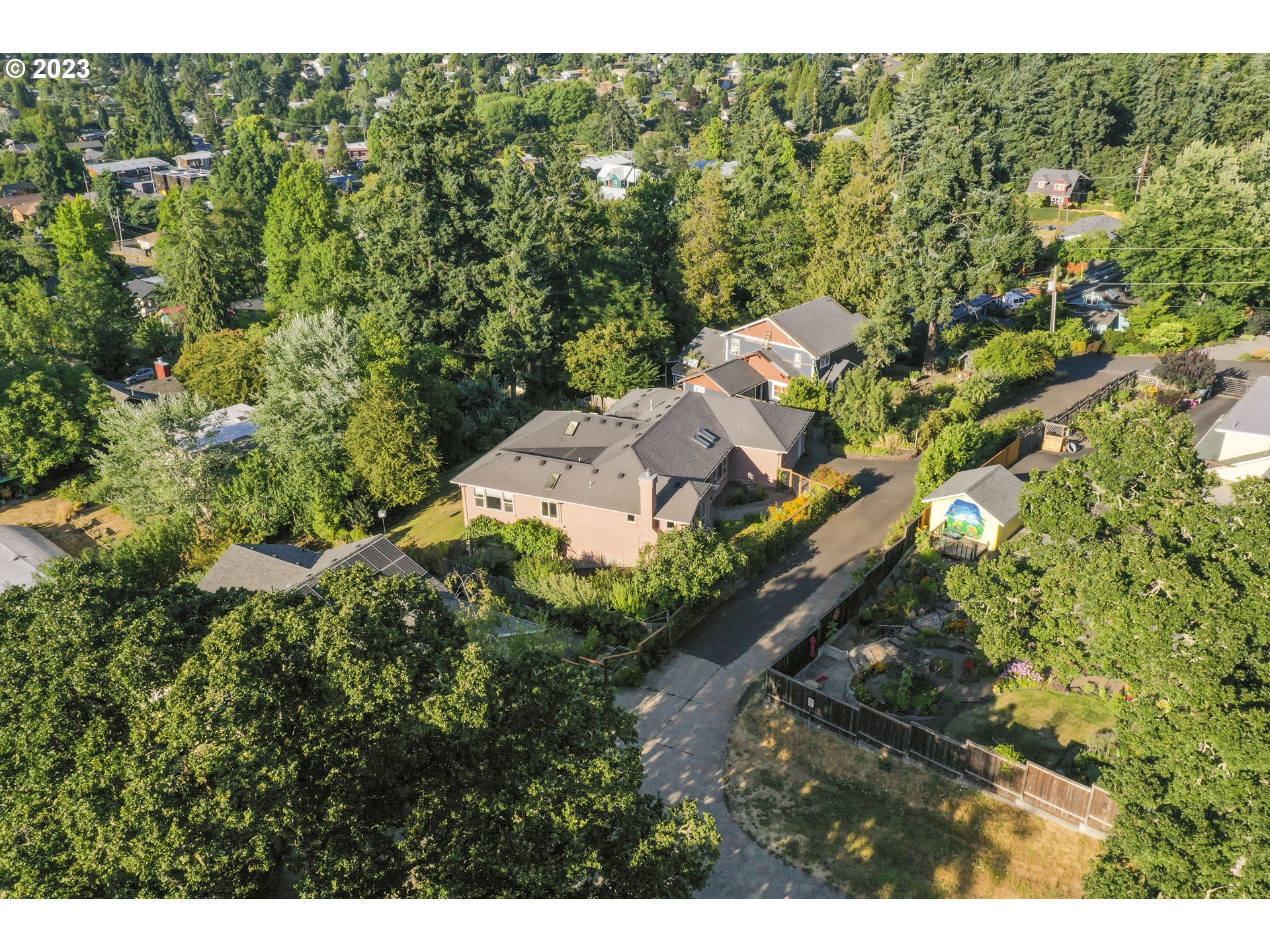 2920 Adams Street Eugene, OR 97405 - Photo 34 of 38 a view of a house with a yard