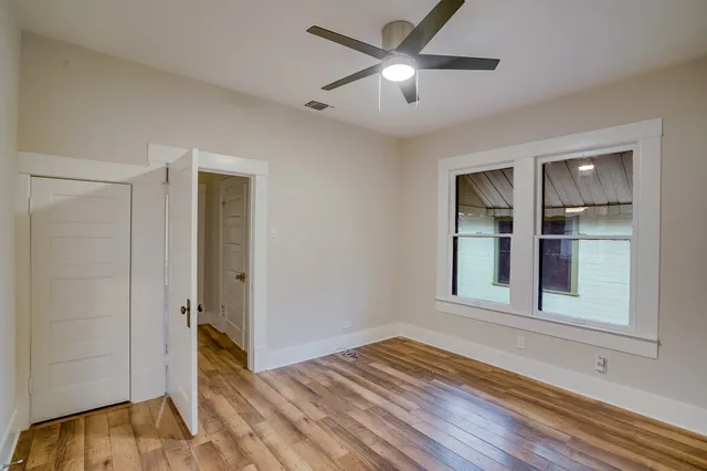 wooden floor and window in a room