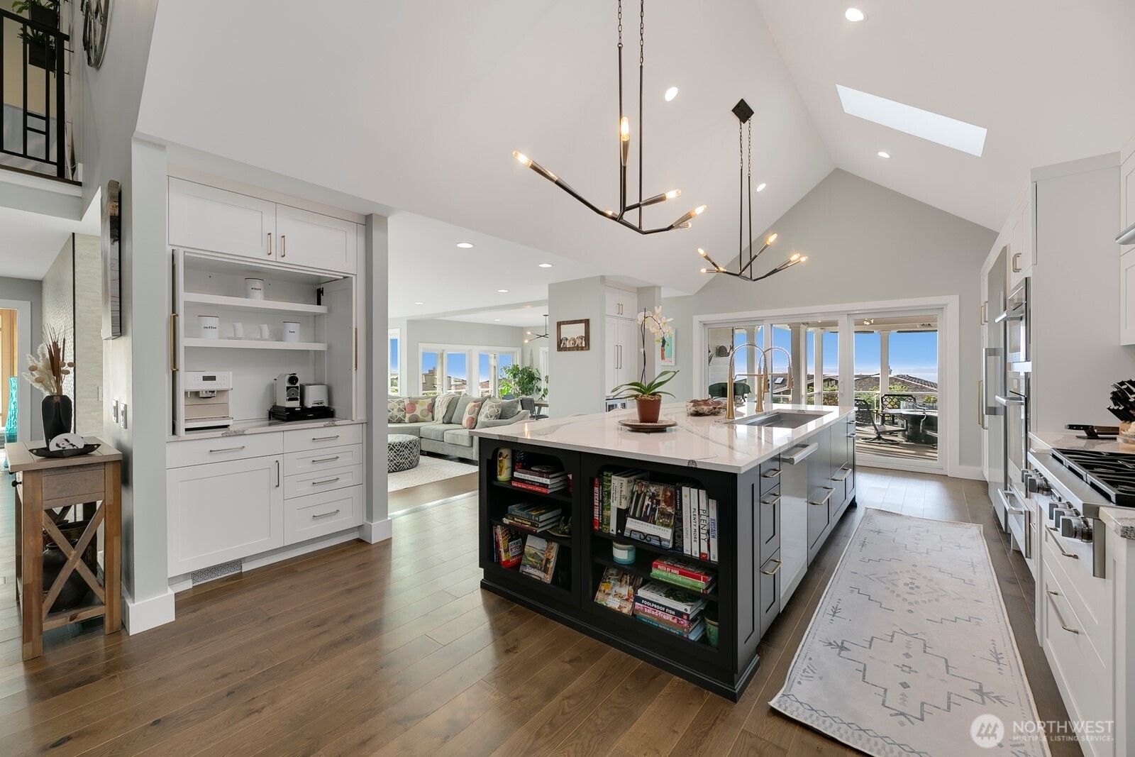 6625 136th Place Southwest Edmonds, WA 98026 - Photo 13 of 40 a large white kitchen with stainless steel appliances a stove a sink and a large refrigerator